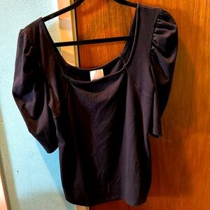 Black top tags still attached never been worn